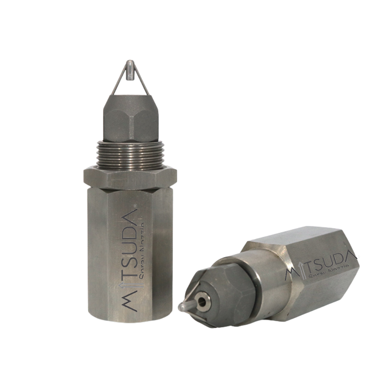 How does the design of Mitsuda's atomizing nozzles contribute to uniform coverage and distribution?